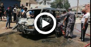 بالفيديو.. إخماد حريق حافلة ركوب في الشونه الشمالية