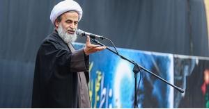 رجلا دين سعودي وإيراني يتحدثان عن قرب يوم القيامة