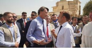 الأممي الاردني حسام الدين فاضل الزعبي برفقة الرئيس ماكرون في الموصل