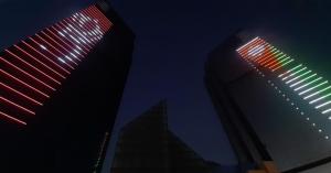 إضاءة أبراج السادس بألوان العلم الأردني واليوبيل الفضي