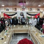 مستشفى المقاصد يحتفل بيوم العلم الأردني